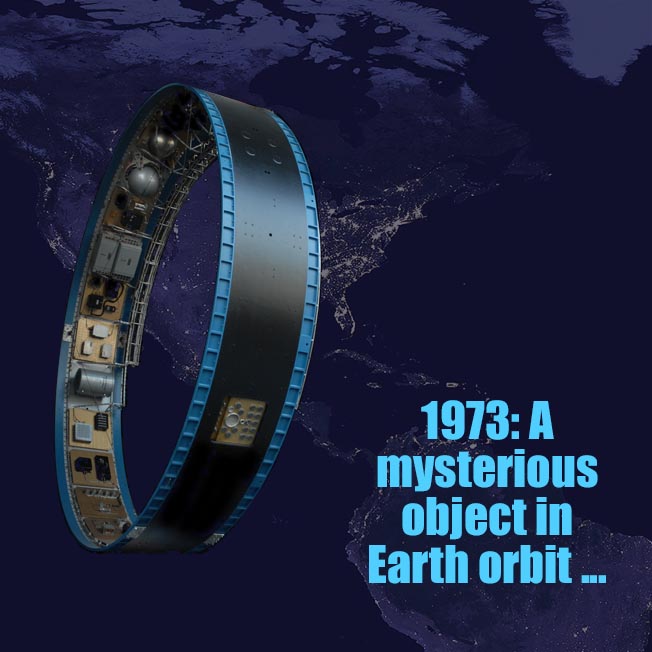 A detached Saturn S-IVB instrumentation ring is pictured in orbit over North American at night.
